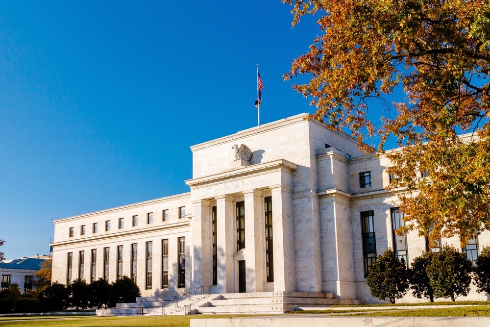 Wibest – Fed Reserve building under the blue sky.