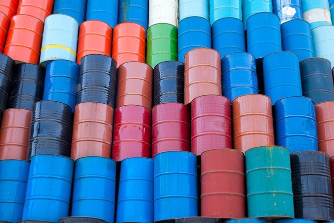 Wibest – Crude oil: Oil barrels stocked together.