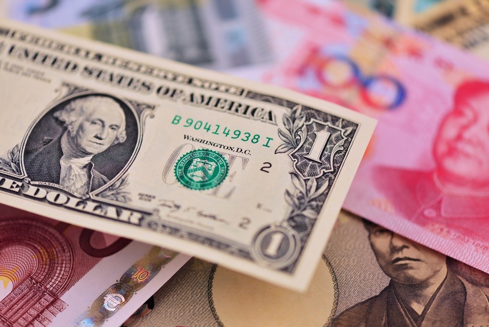 Wibest – EUR-USD: US Dollar, Euro, Japanese Yen, and Chinese Yuan bills. 